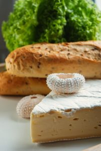 white and brown bread on white ceramic plate